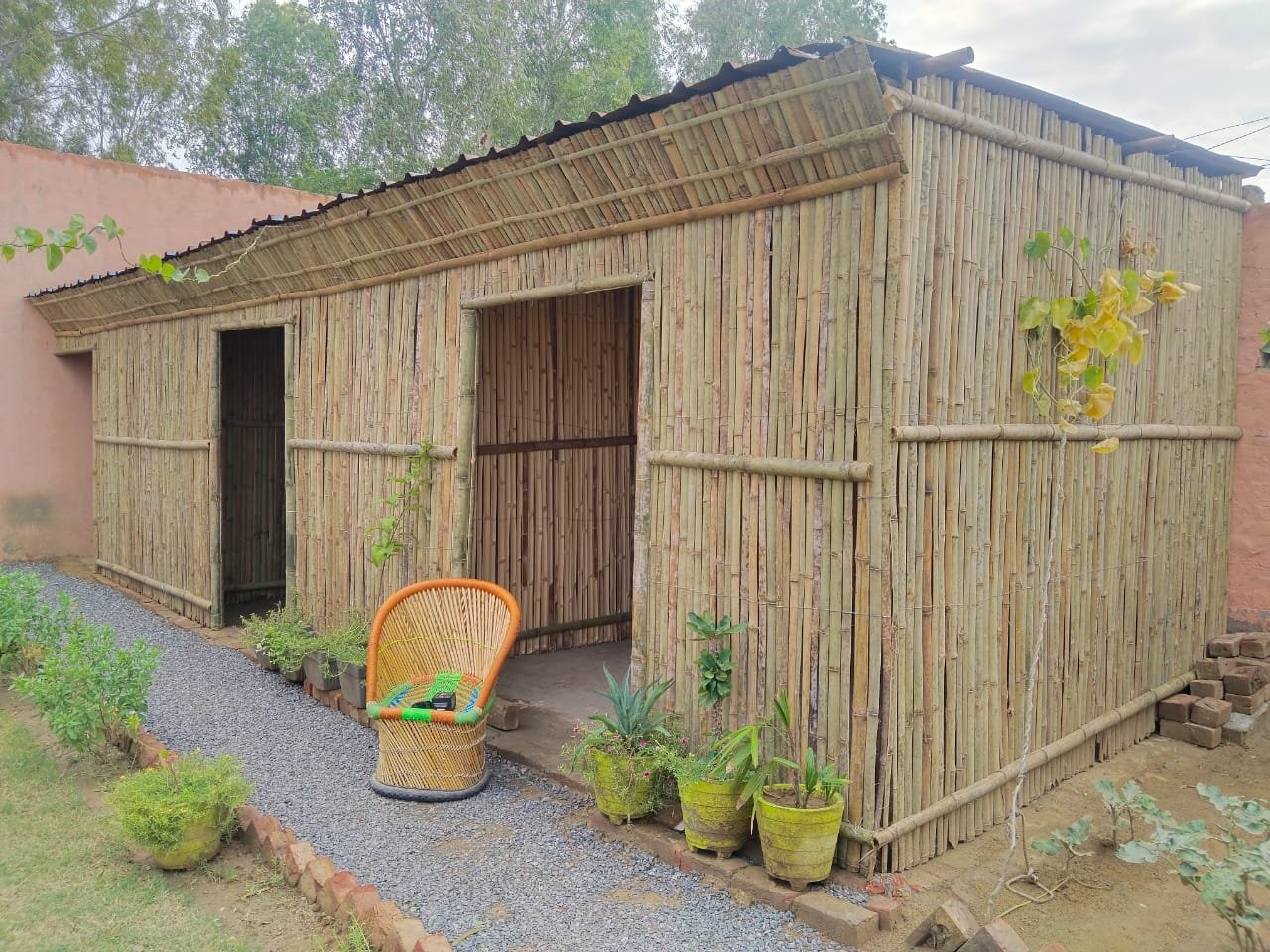 Traditional bamboo cottage therapy suites at Panchsheel Aarogya Dhaam